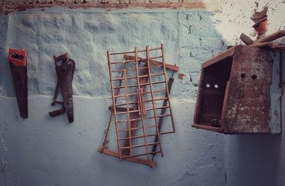 Hand tools hanging on wall