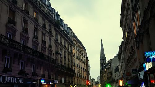Low angle view of skyscrapers against sky