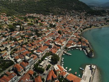 High angle view of townscape by sea