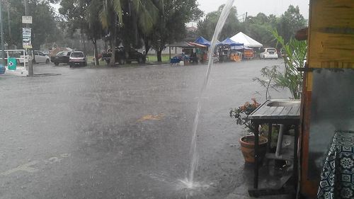 View of wet street in city