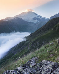 Scenic view of snowcapped mountains against sky