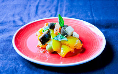 Close-up of fruits in plate on table