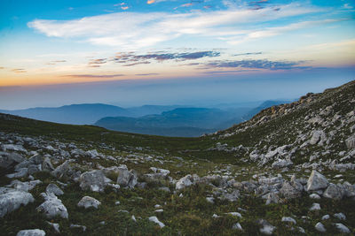 Scenic view of landscape against sky during sunset