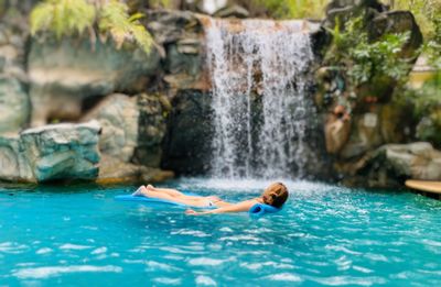 Woman swimming in pool