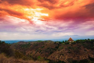 View of temple against cloudy sky