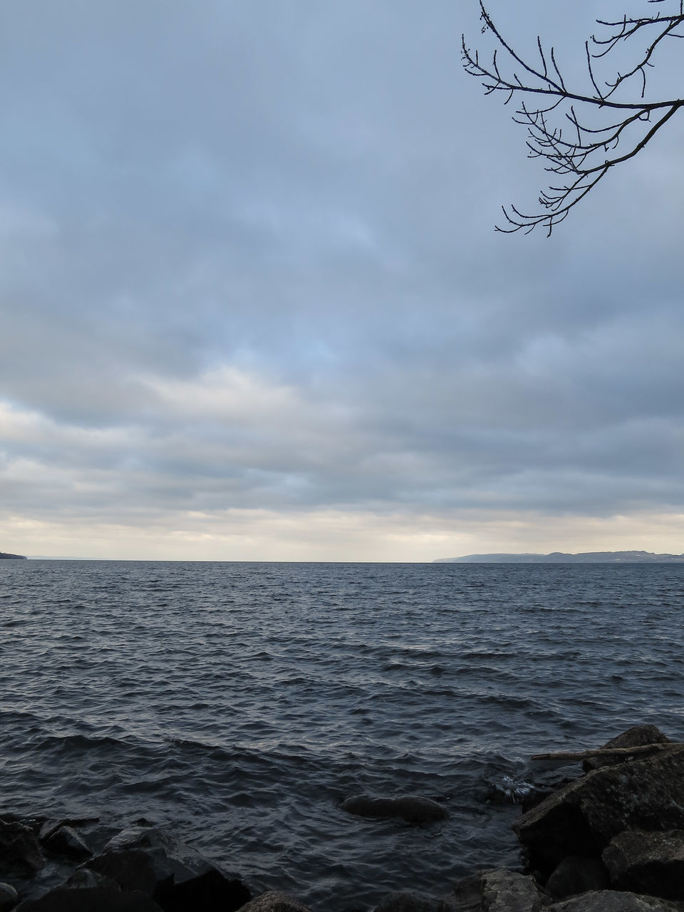 sea, water, sky, horizon over water, tranquil scene, scenics, tranquility, beauty in nature, cloud - sky, nature, cloudy, cloud, waterfront, idyllic, rippled, seascape, outdoors, no people, overcast, calm