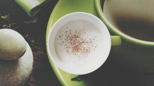 High angle view of coffee cup on table