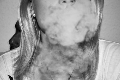 Close-up of woman smoking