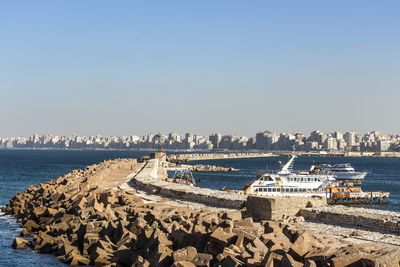 Panoramic view of beach against clear sky