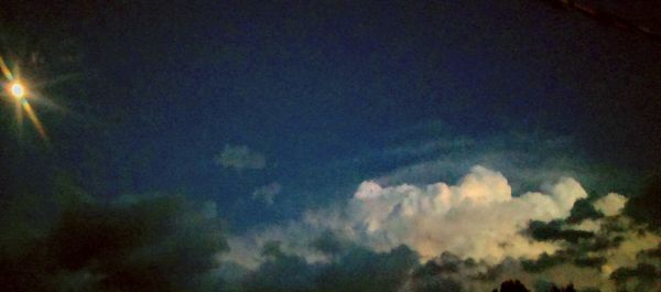 Low angle view of cloudscape at night