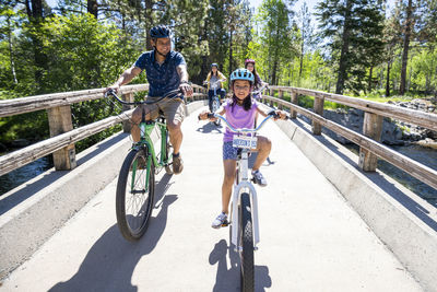 A family enjoys a bike ride on a bike path in south lake tahoe, ca