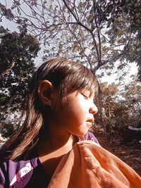 Portrait of teenage girl looking away