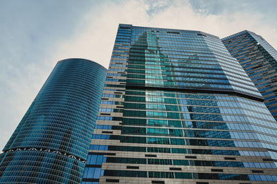 Low angle view of modern building against sky