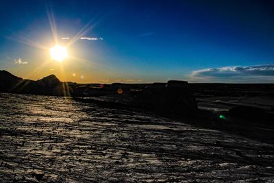 Scenic view of landscape against sky during sunset