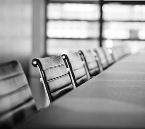 Empty chairs arranged in office