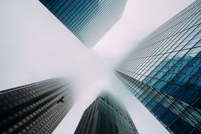 Low angle view of modern buildings against sky