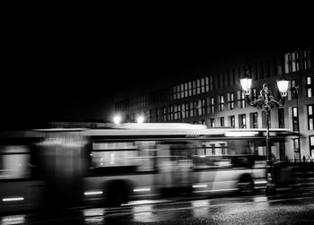 Blurred motion of cars on road in city at night