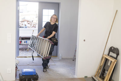 Woman renovating house