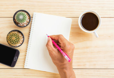 High angle view of coffee cup on table
