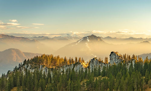 Scenic view of mountains against sky during sunset