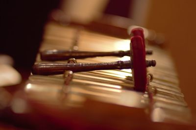 Close-up of guitar on table