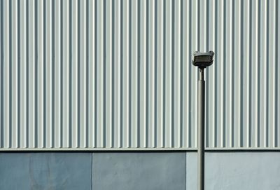 Full frame shot of metallic structure against wall