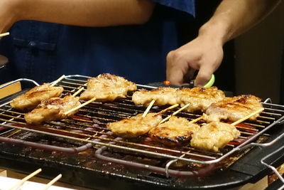 Close-up of meat on barbecue grill