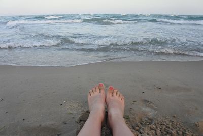 Low section of woman on beach