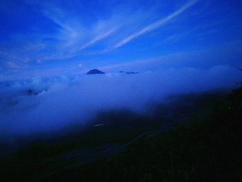 Aerial view of landscape against dramatic sky