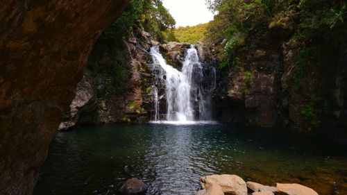 View of waterfall in forest