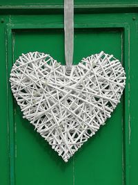Directly above shot of heart shape on metal door