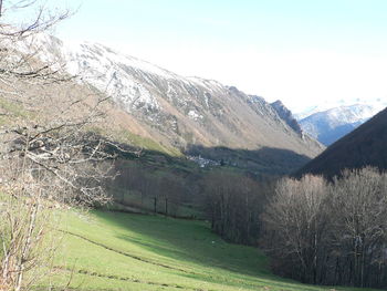 Scenic view of snowcapped mountains against sky