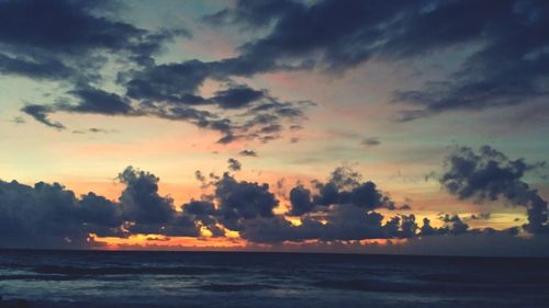 Scenic view of sea at sunset