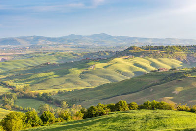 Tuscan countryside rolling landscape view with valleys and fields