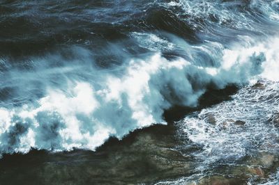 High angle view of waves in sea