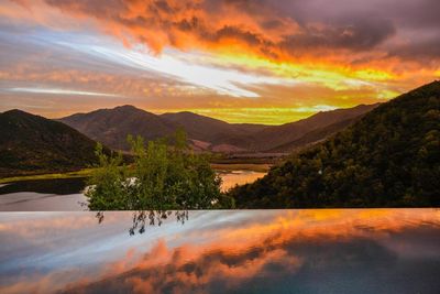 Scenic view of mountains at sunset