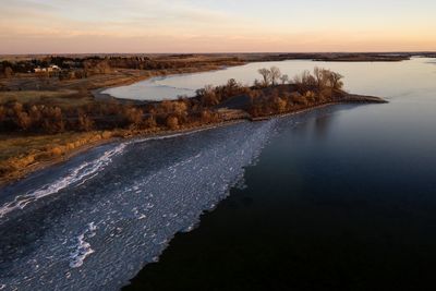 Morning sunset over frozen lake