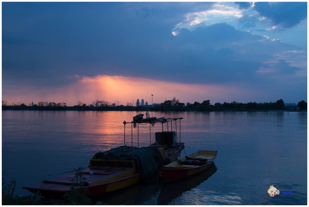 water, nautical vessel, boat, sky, transportation, sunset, mode of transport, transfer print, cloud - sky, moored, tranquil scene, waterfront, tranquility, sea, auto post production filter, beauty in nature, scenics, cloud, nature, reflection