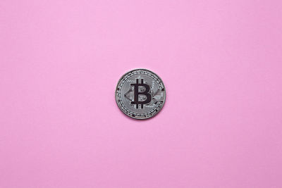 Directly above shot of clock against blue background