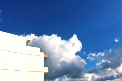 Low angle view of building against blue sky