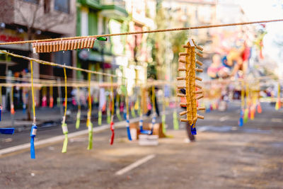 Close-up of swing hanging in playground