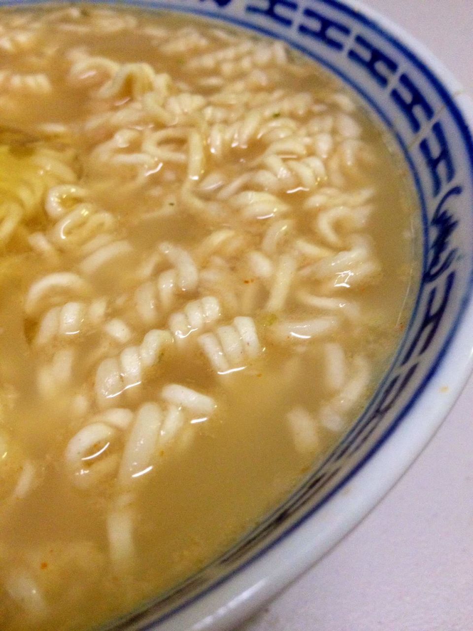 CLOSE-UP OF SOUP WITH BOWL