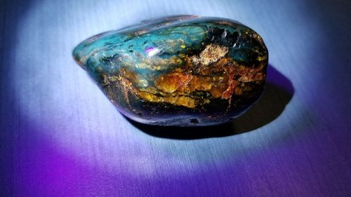 Close-up of multi colored stones on rock