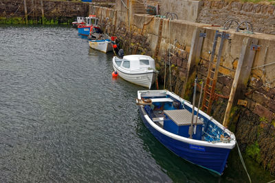 High angle view of boats moored at lake