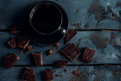 High angle view of coffee cup on table