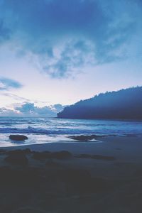 Scenic view of sea against sky at sunset