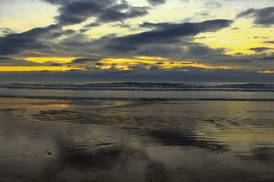 Scenic view of sea against sky at sunset