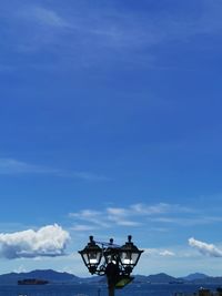 Low angle view of airplane against sky