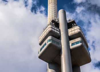 Low angle view of smoke stack against sky