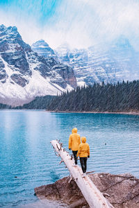 Scenic view of lake against mountain range